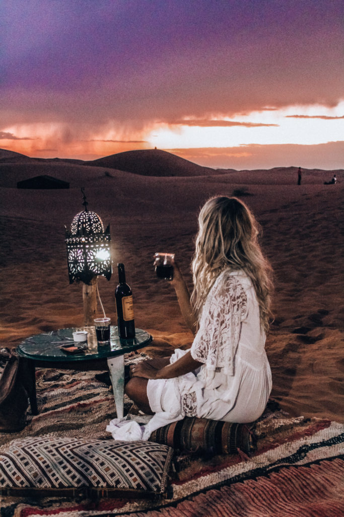 sahara desert camp at dusk