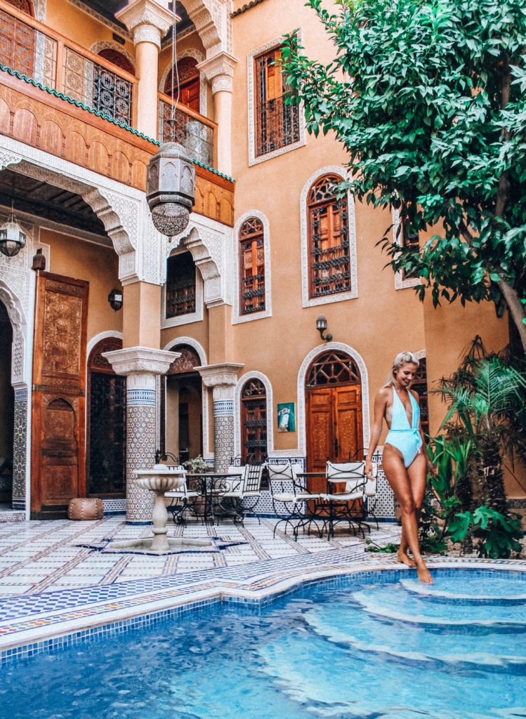 What to Wear in Morocco as a Woman- Morocco is a country everyone should visit at least once. From the beautiful sahara desert to the perfect blue city chefchouen. But what to wear in morocco? Here is a guide on how to dress for morocco and what to pack for morocco as a solo woman traveling #morocco #moroccotravel #packingtips #beautifulplaces what to wear in morocco | morocco packing guide |morocco fashion |morocco travel tips | morocco travel advice | morocco travel guide