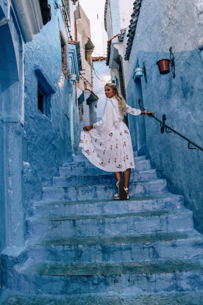 girl on steps in chefchaouen